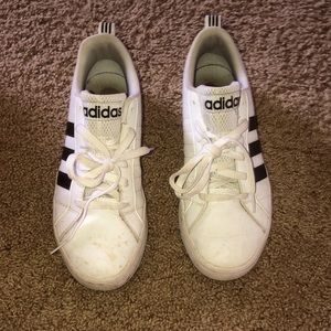 Adidas stopped black and white low top shoes